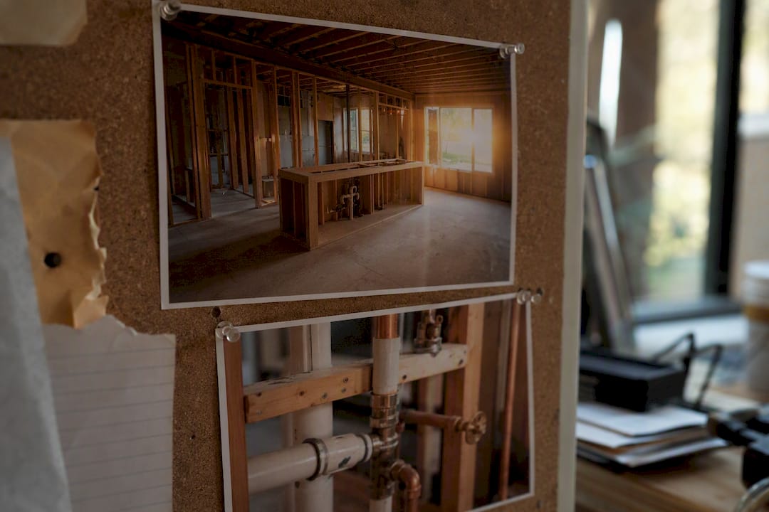 Jobsite wide shot and close-up photo pinned on board